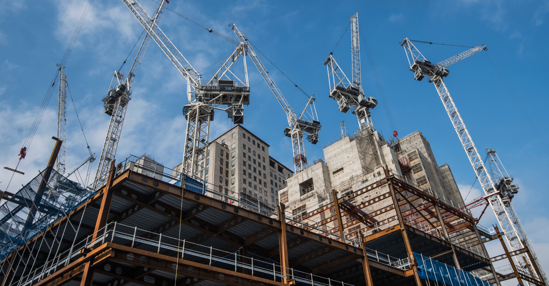 Construction and engineering project site with cranes and building work